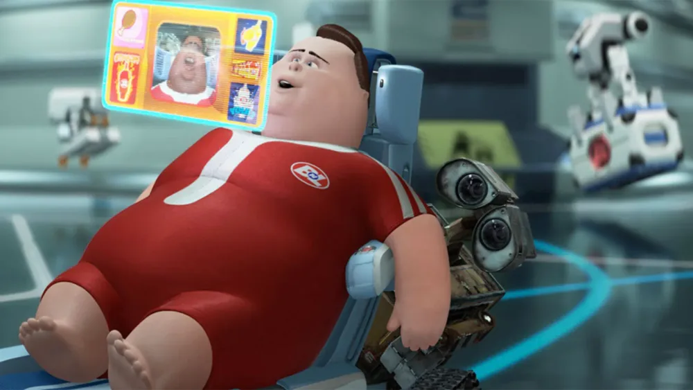 fotograma de la pelicula wall-e con un humano viendo una pantalla